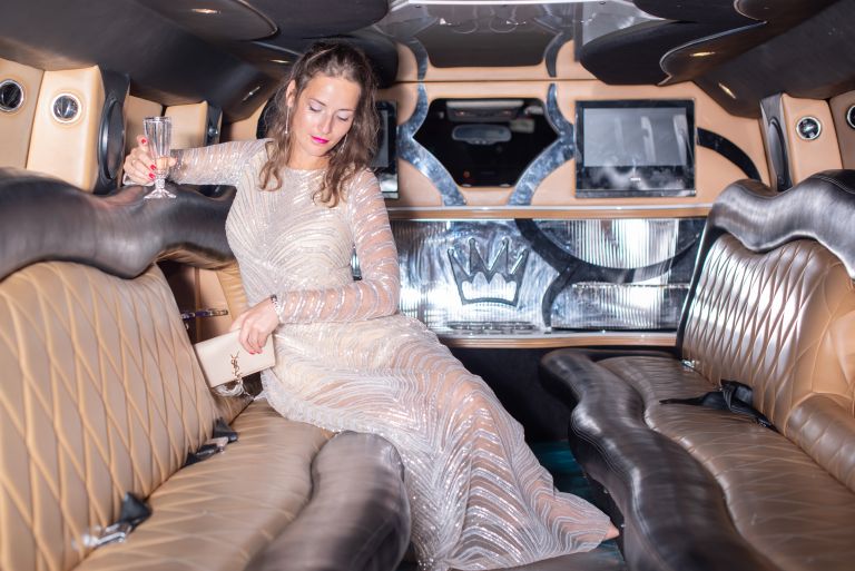 Woman sitting in a limo