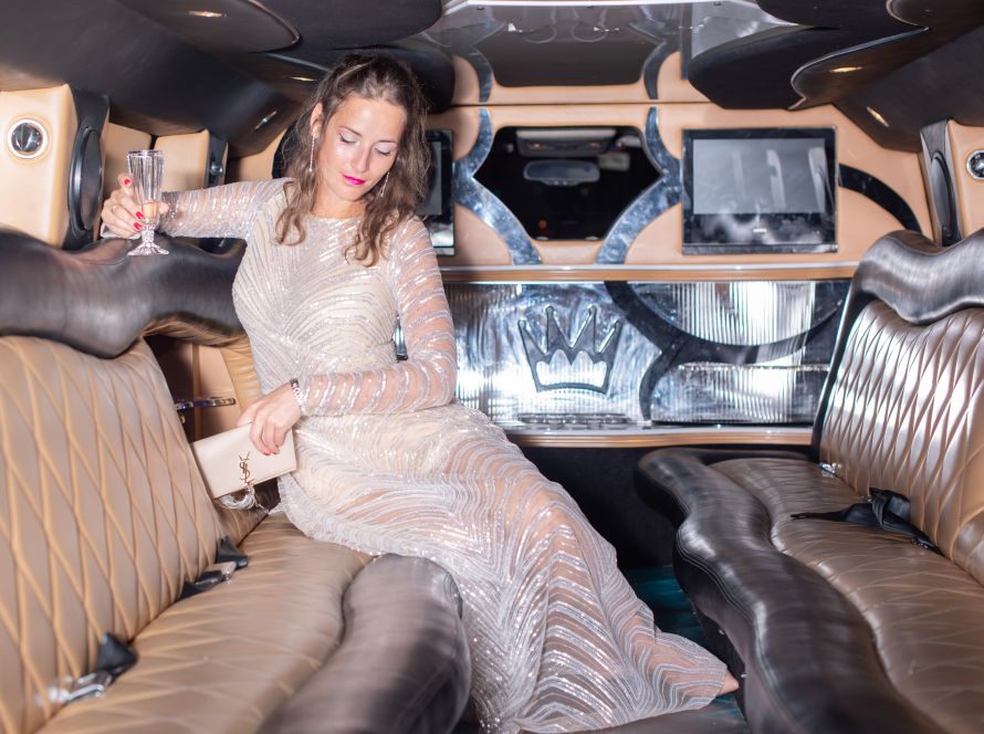 Woman sitting in a limo